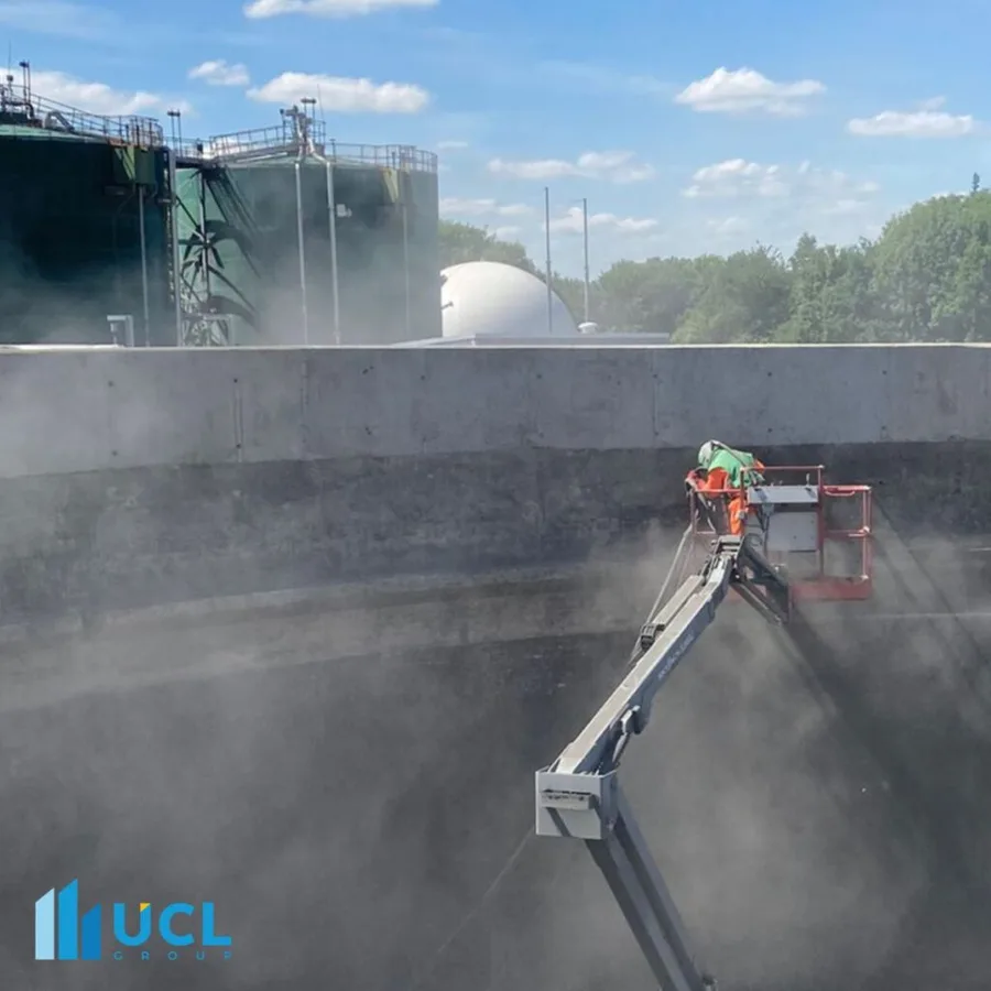 Injection resin being applied during a structural concrete crack repair